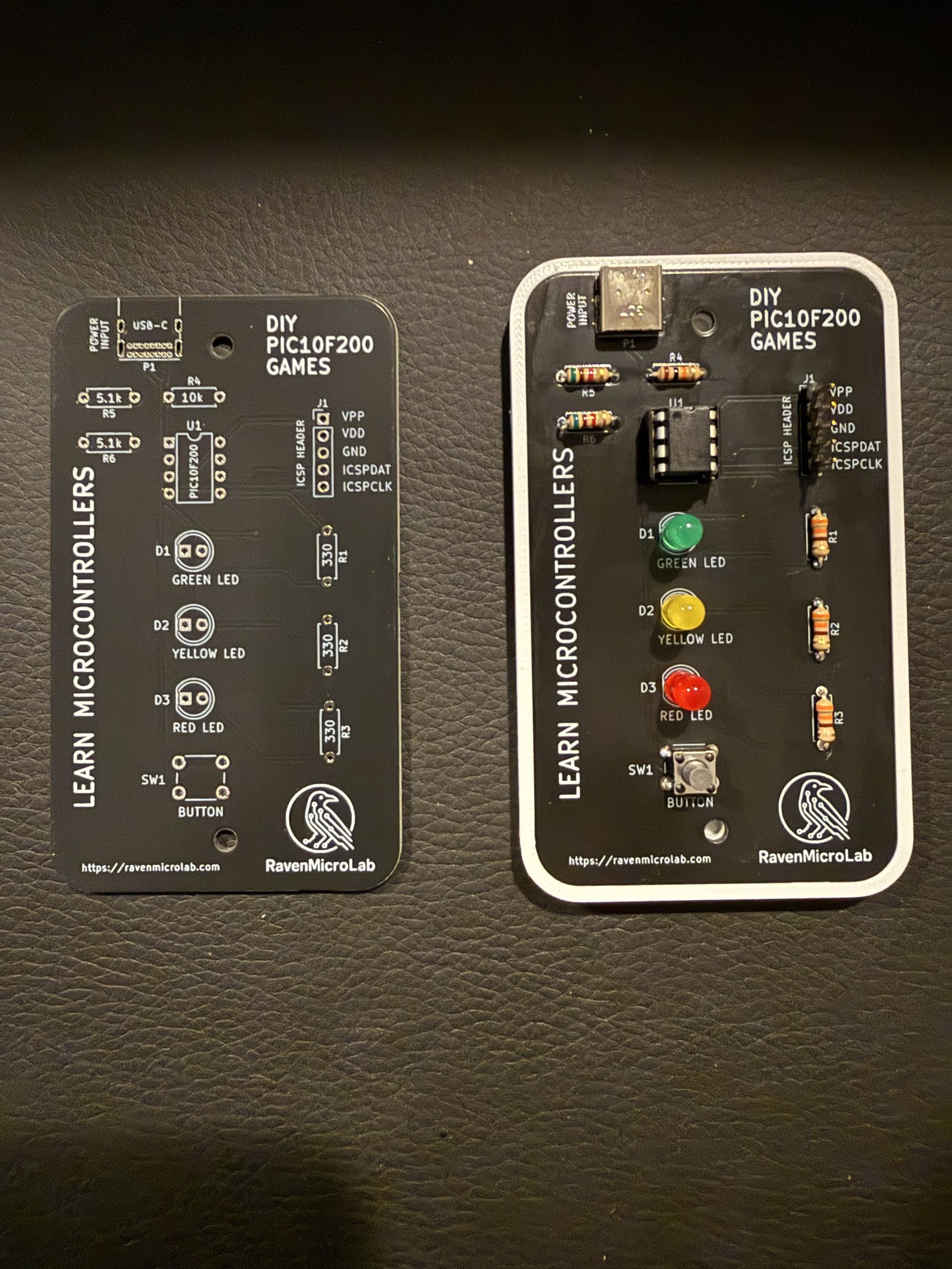 Bare and assembled PIC10 Games PCBs sitting side by side